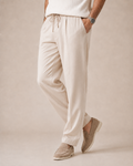 The Riviera ivory drawstring trousers